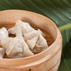 Dumplings in bamboo steamer
